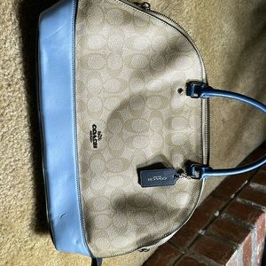 Preowned coach purse and wallet. Approximately 13inch long